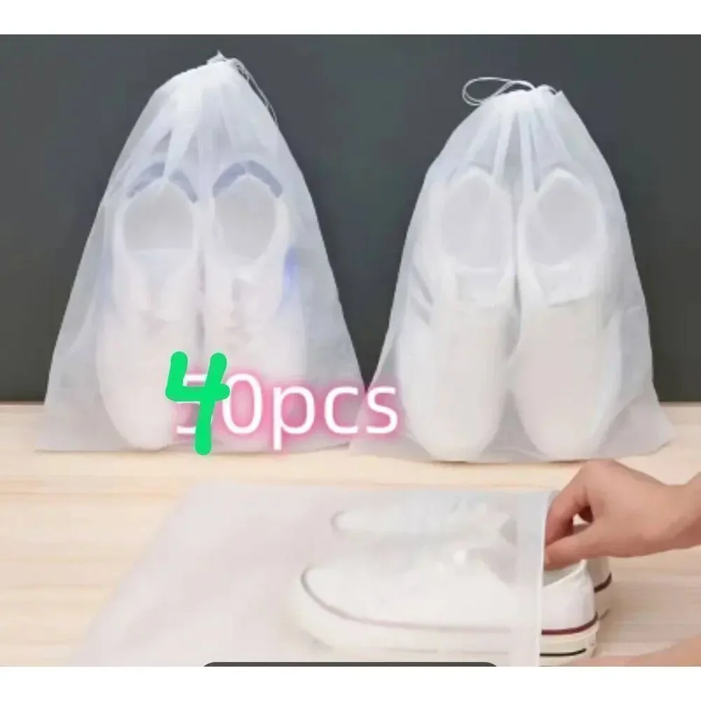 1 pair of Used flats or 30 storage shoe bags